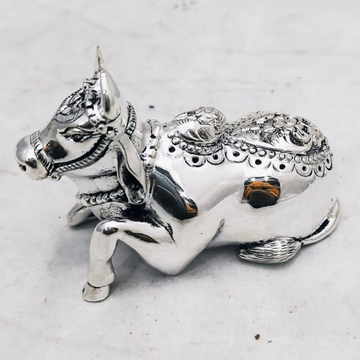 Pure silver nandi idol in antique carvings & solid... by 