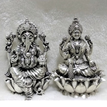 Pure silver lakshmi ganesh idols in high finishing... by 