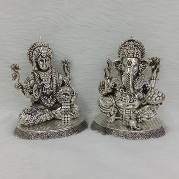 Pure silver idol of laxmi ganesha in antique polis... by 