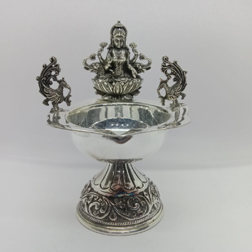 Pure silver diya in antique polish with laxmi and... by 