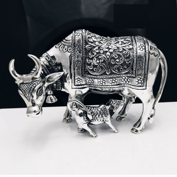 Pure silver cow & calf in Fine antique carvings po... by 
