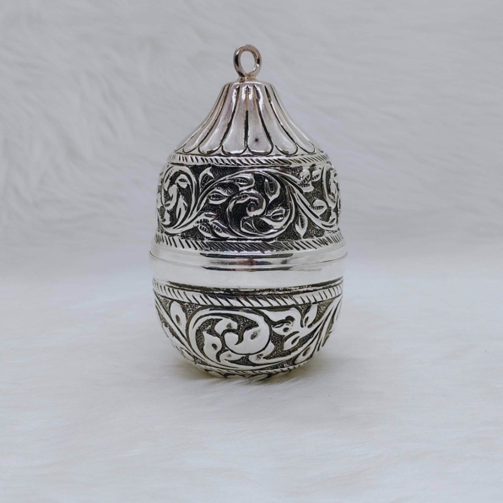 Pure silver nariyal in antique carvings for pujan and tilak