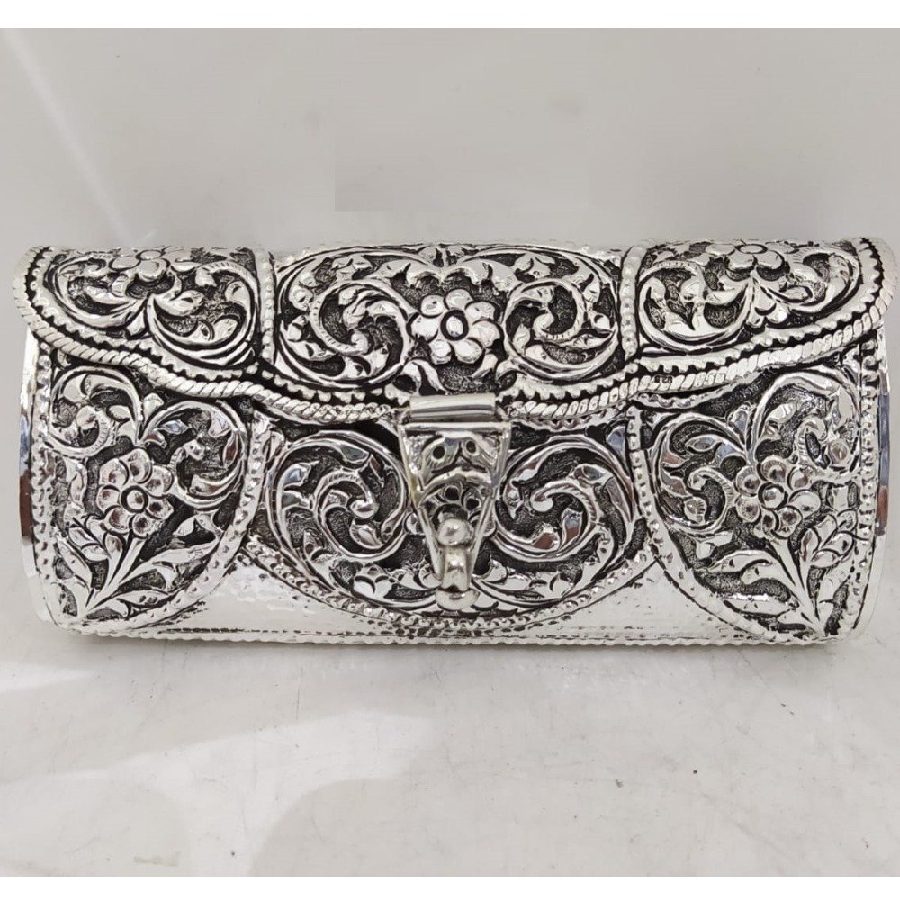 Puran 925 pure silver clutch in fine floral carving.