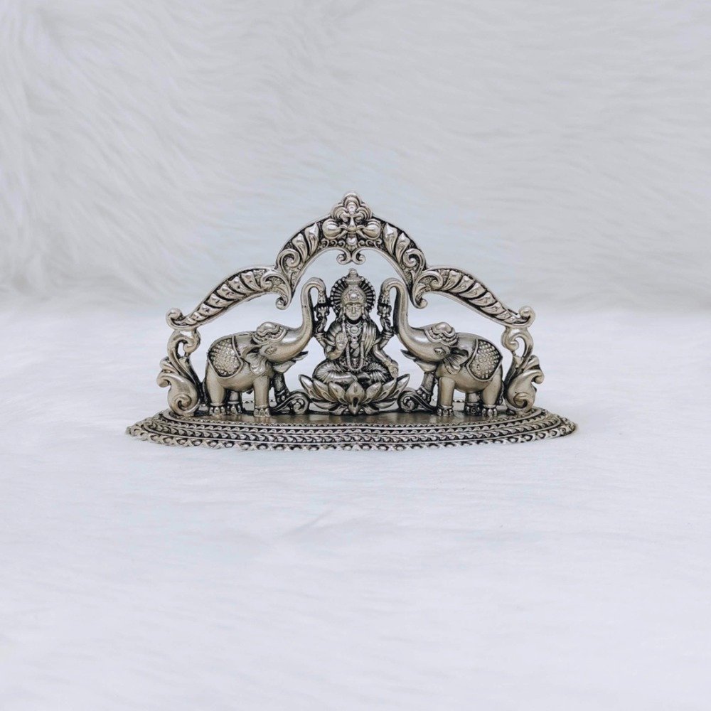 Pure silver laxmi ji with elephant idol in high antique fine work