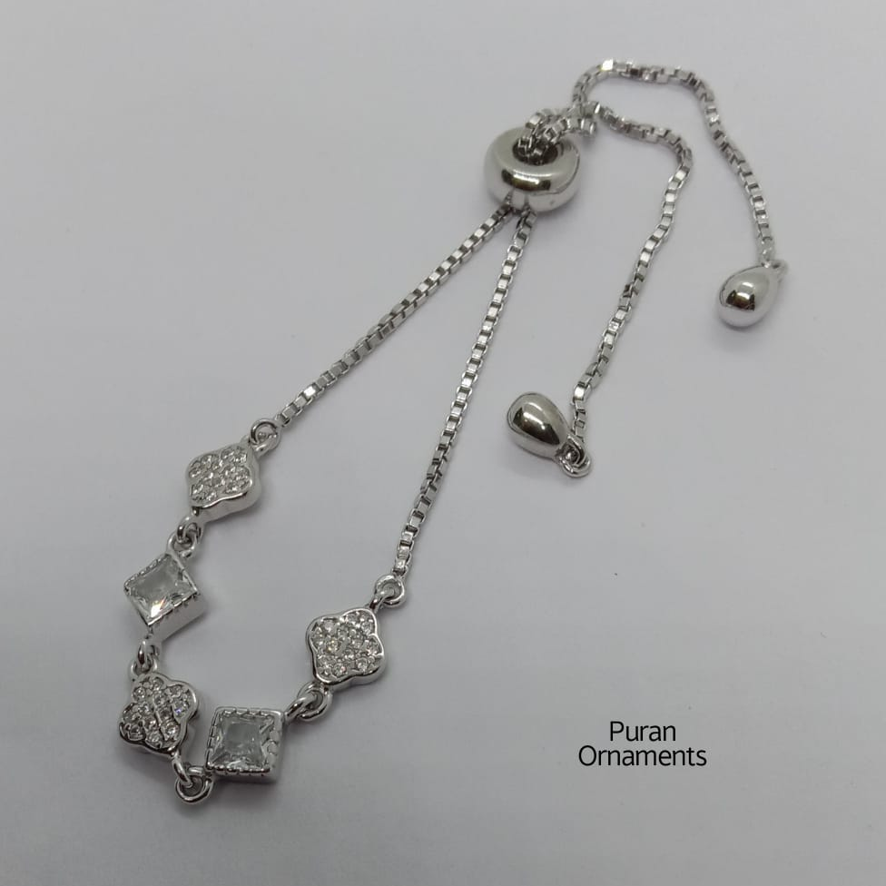 silver fancy bracelet, stone work and adjustable in chain