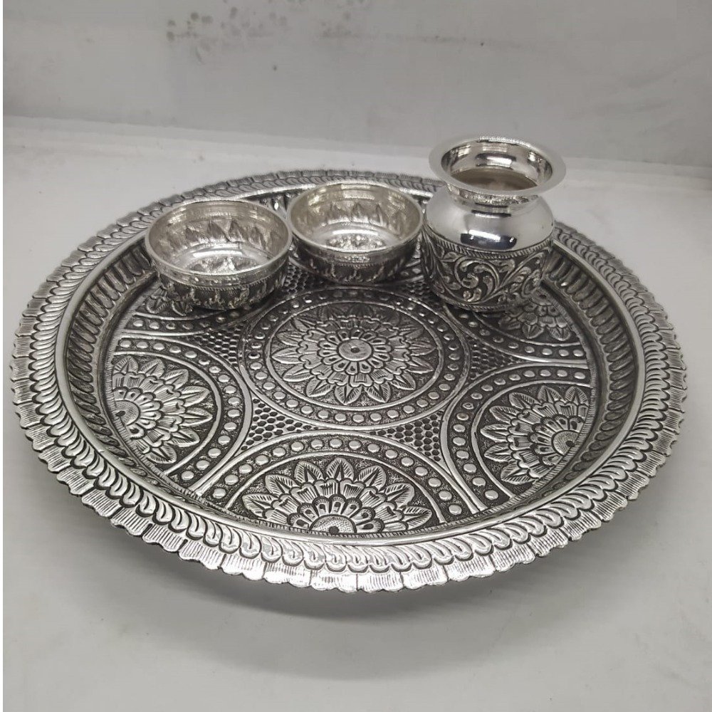 rangoli motif carving aarta set in real silver by puran